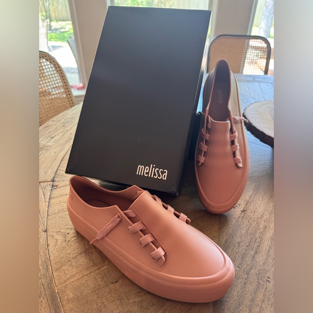 Melissa brand slip on sneakers.